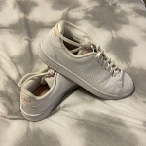 Women’s white and pink adidas sneakers